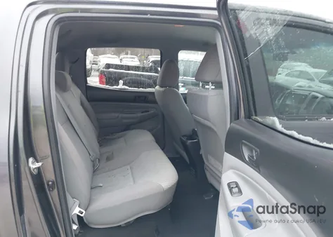 2014 Toyota Tacoma Base V6 z USA, uszkodzony, nr VIN 3TMLU4EN7EM146476